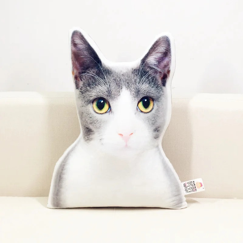 Cat-shaped pillow with a white background