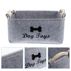Gray pet toy storage basket with 'Dog Toys' and bone icon, shown from different angles.