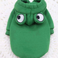 Green pet sweater with owl design on a white background