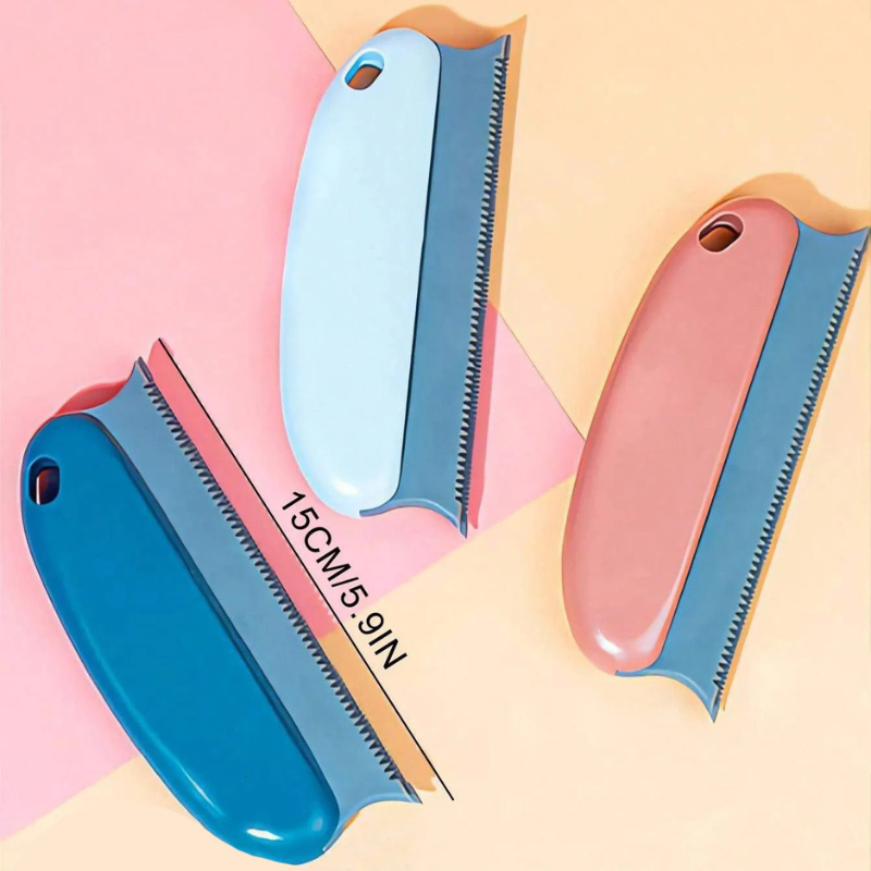 Three相见器 (separating tools) with blue and pink handles on a colorful background
