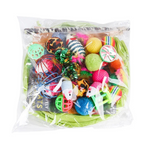 Assorted colorful cat toys in a clear plastic bag on a white background