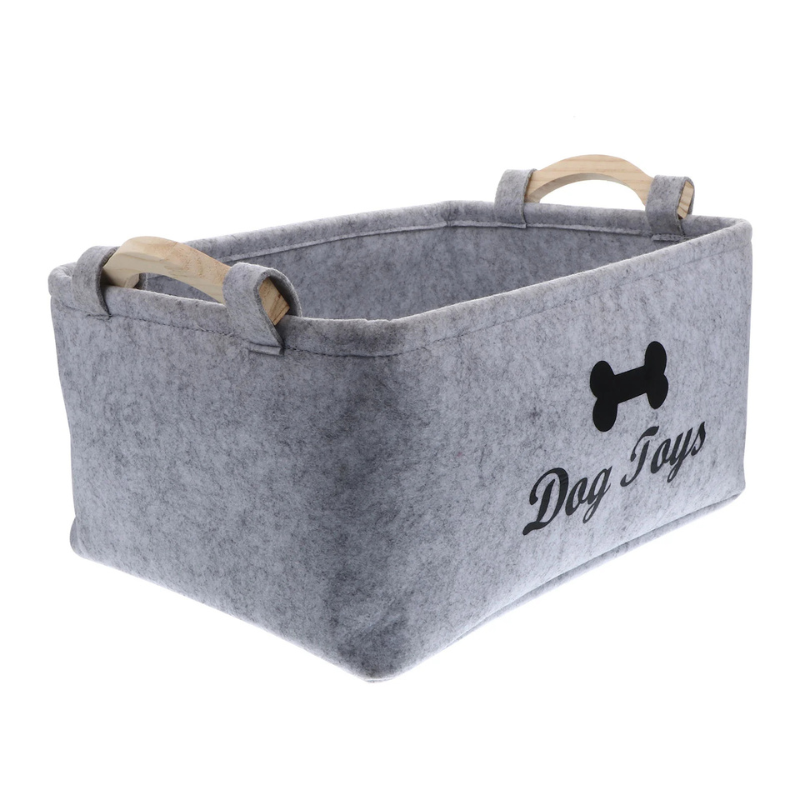 Gray storage basket with 'Dog Toys' text and bone icon on a white background