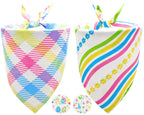 Two colorful dog bandanas with geometric patterns on a white background.