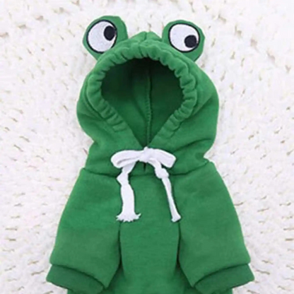 Green frog costume with a hood on a textured white background