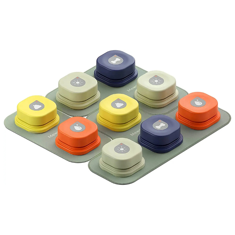 Set of colorful folding cups on a gray tray with a white background