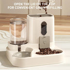White pet feeder with grain refilling feature on a wooden floor.