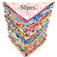 Stack of colorful fabric pieces with '50 pcs' text on a white background
