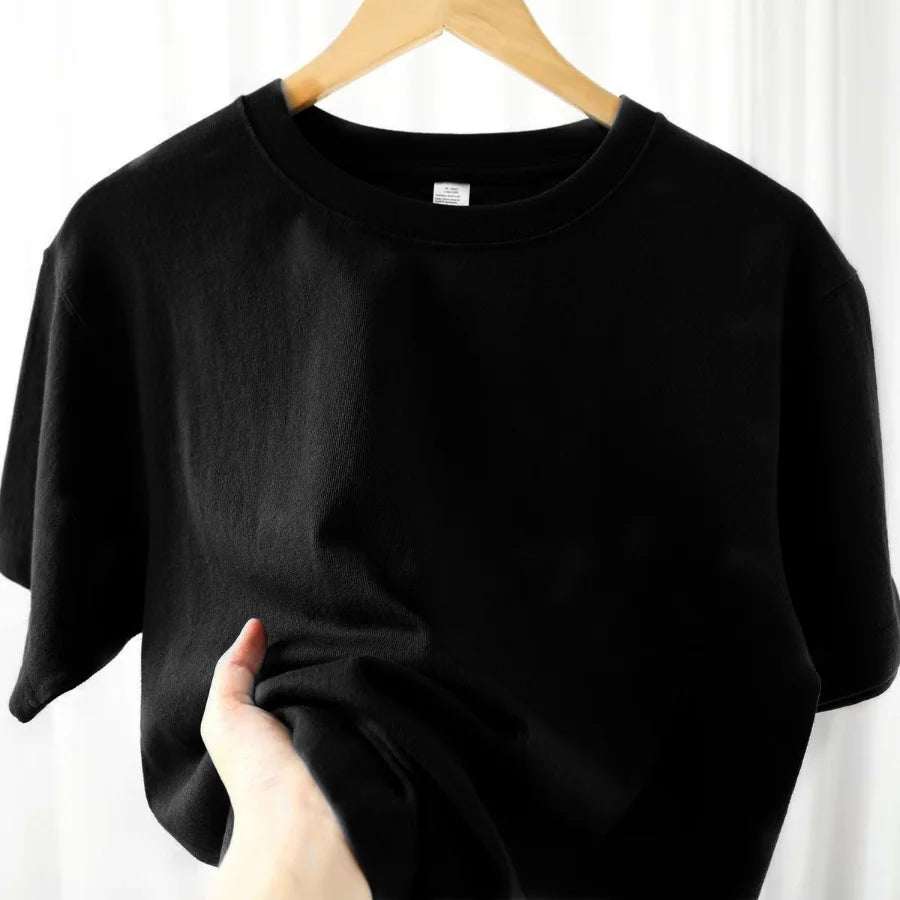 Unisex short-sleeve cotton T-shirt, soft and breathable for warm weather.