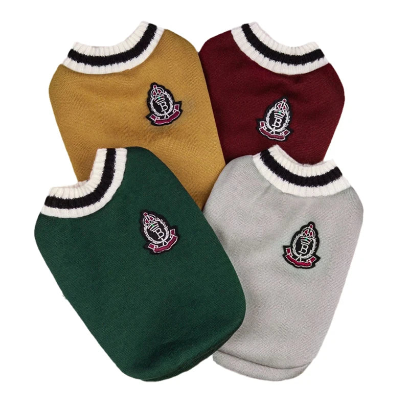 Four dog sweaters in brown, red, green, and gray with a logo on a white background