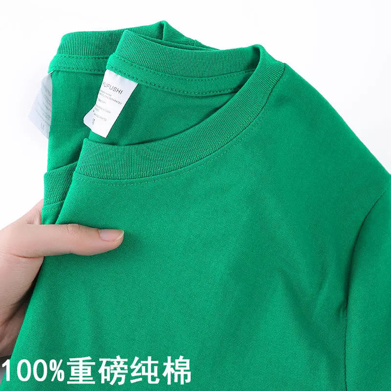 100% cotton T-shirt with half sleeves and a simple, solid color design.