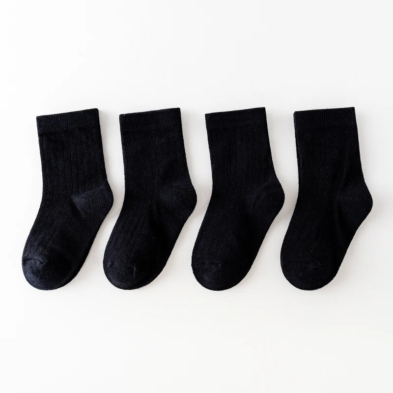 Four pairs of children's socks for spring and autumn, striped versatile style, mid-calf socks with a school style.