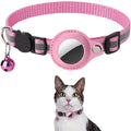 Pink pet collar with a bell and reflective patch, worn by a cat.