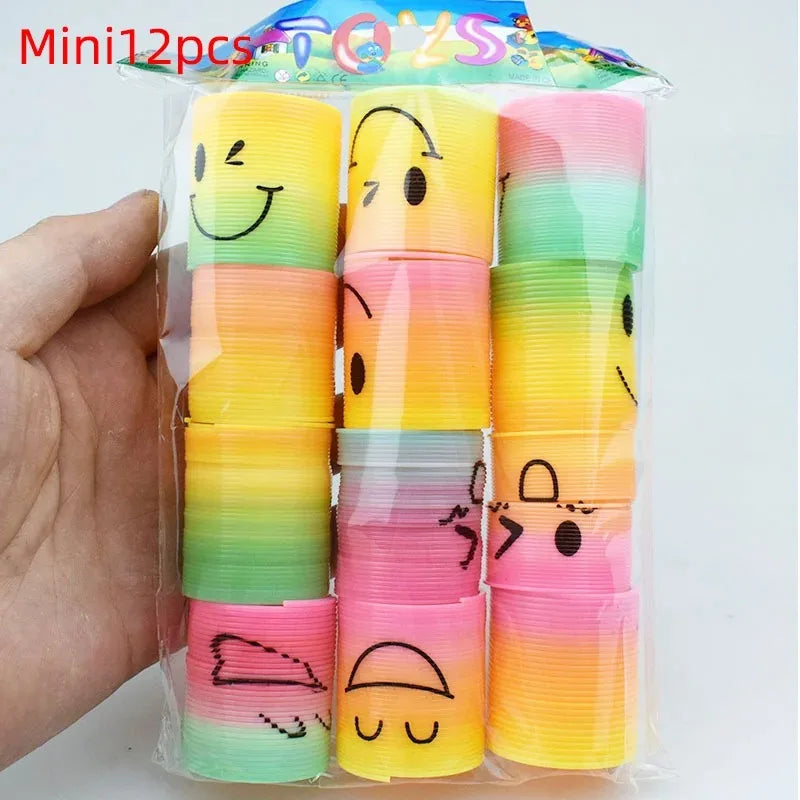 24PCS Rainbow Magic Springs Circle Toys Kids Birthday Party Favors Guests Giveaway Small Gifts Pinata Fillers Flexible Funny Toy
