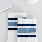 Four pairs of children's socks for spring and autumn, striped versatile style, mid-calf socks with a school style.