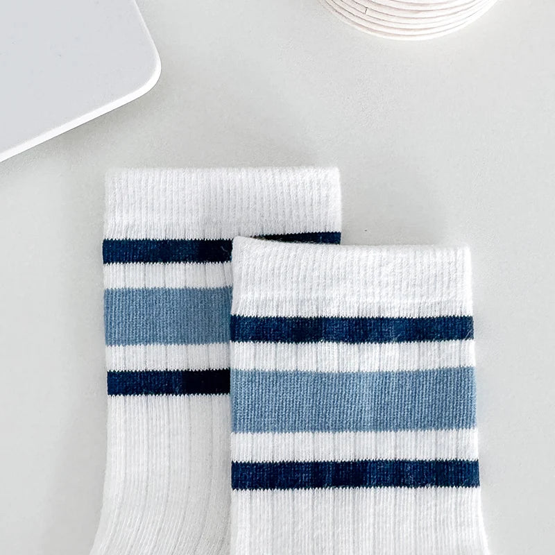 Four pairs of children's socks for spring and autumn, striped versatile style, mid-calf socks with a school style.