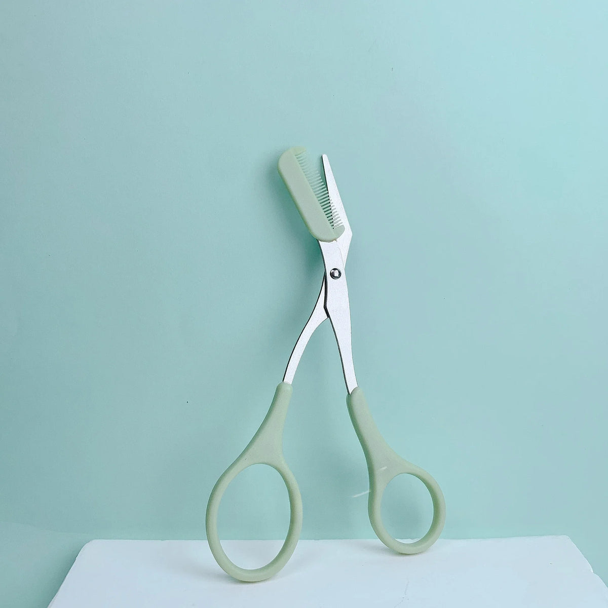 Pink Eyebrow Trimming Scissors – Built-In Comb Grooming Tool