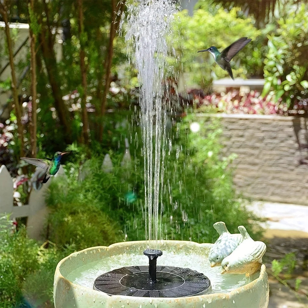 Solar birdbath fountain on sunny day