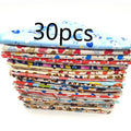 Stack of colorful fabric strips with a visible '30 pcs' label on a white background