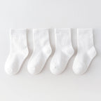 Four pairs of children's socks for spring and autumn, striped versatile style, mid-calf socks with a school style.