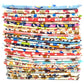 Stack of colorful fabric strips with various patterns on a white background