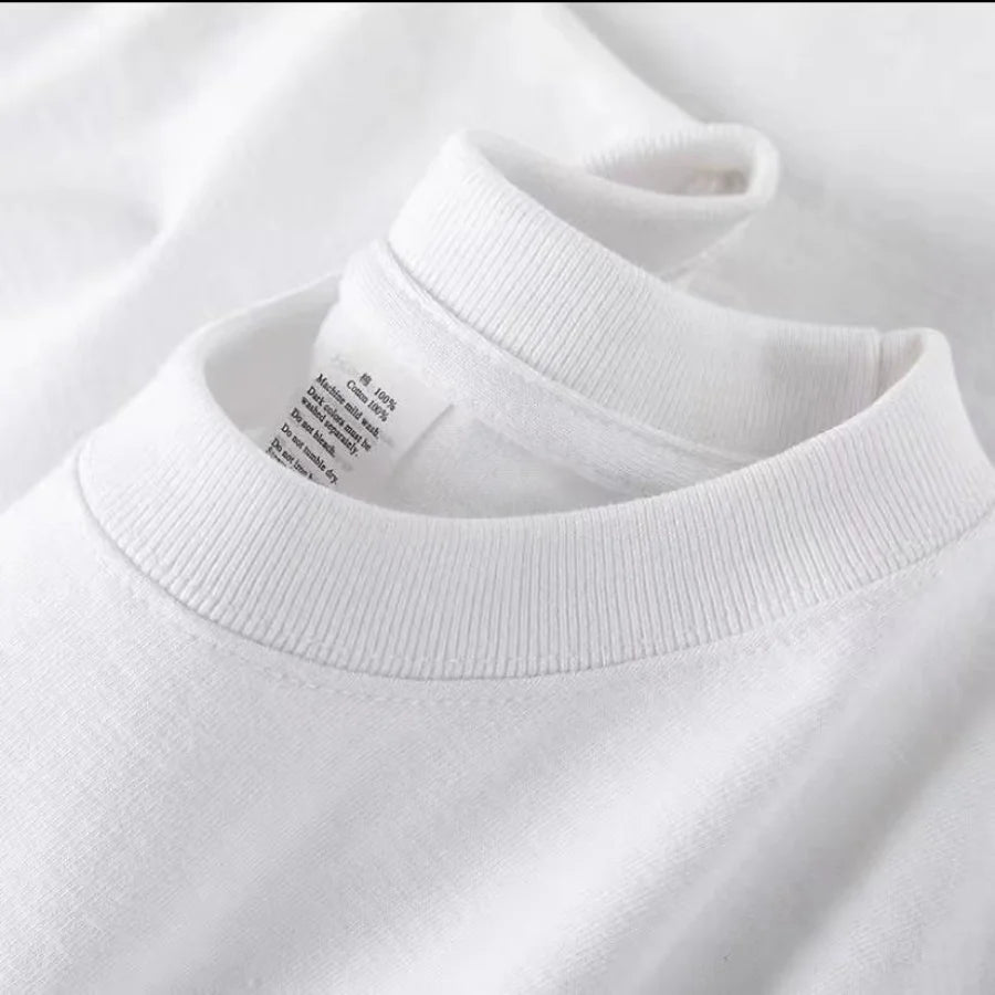 Korean-style cotton T-shirt for both men and women, offering a loose, relaxed fit.