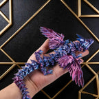 Colorful gemstone 3D-printed dragon egg figurine with wings and egg shape, featuring flexible joints and handcrafted desktop dec
