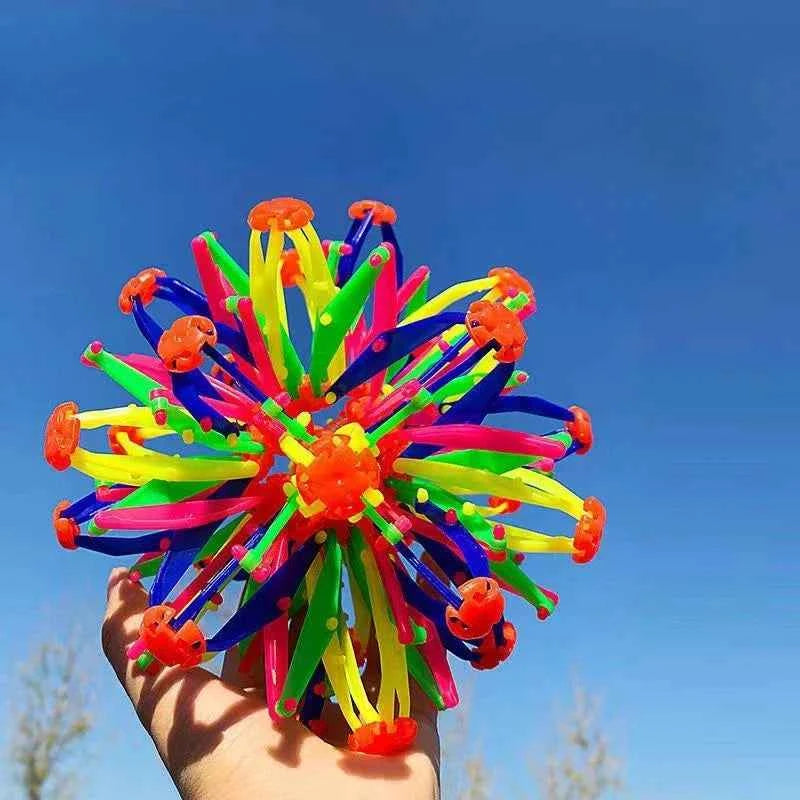 Rainbow Stress Ball for Kids - Colorful Expandable Fidget Toy, Durable Magic Sensory Ball for Outdoor Sports & Anxiety Relief