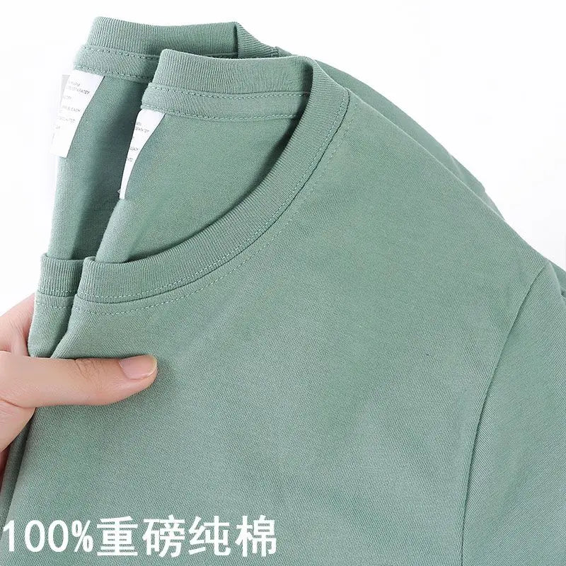 Solid color O-neck T-shirt for men and women, available in sizes M to 4XL.