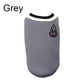 Gray dog sweater with a logo on a white background