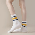 Four pairs of children's socks for spring and autumn, striped versatile style, mid-calf socks with a school style.