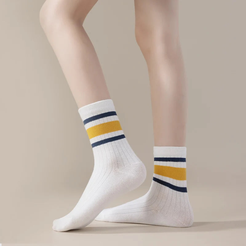 Four pairs of children's socks for spring and autumn, striped versatile style, mid-calf socks with a school style.