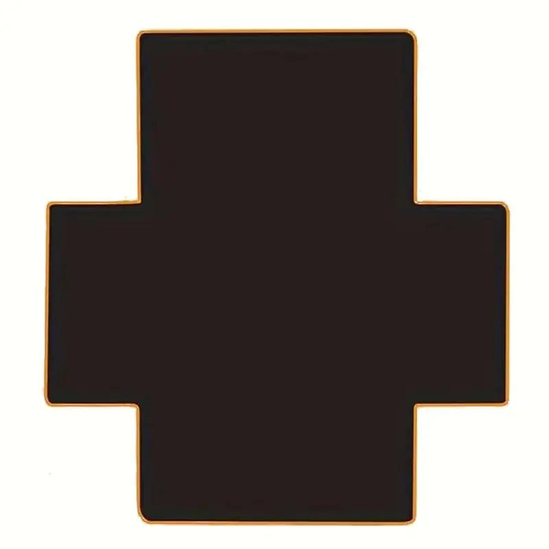 Black cross-shaped object with gold border on a white background