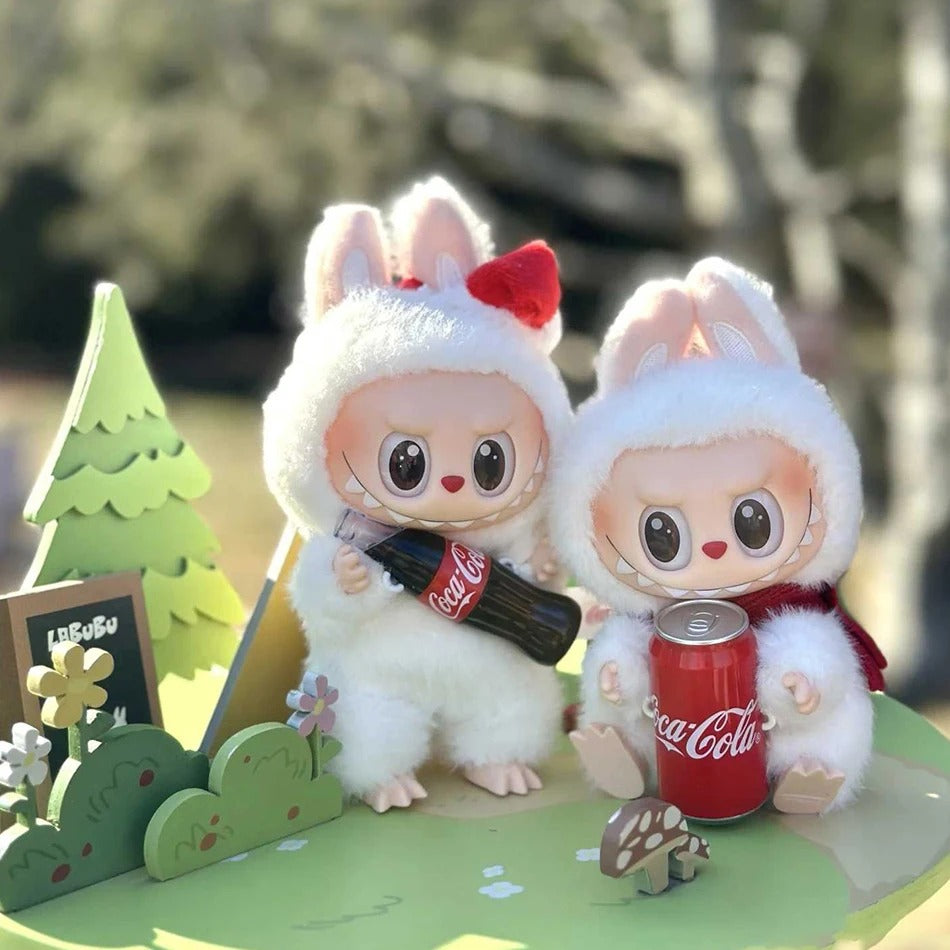 Unboxed Labubu macaron-themed figurines arranged in a collector's display